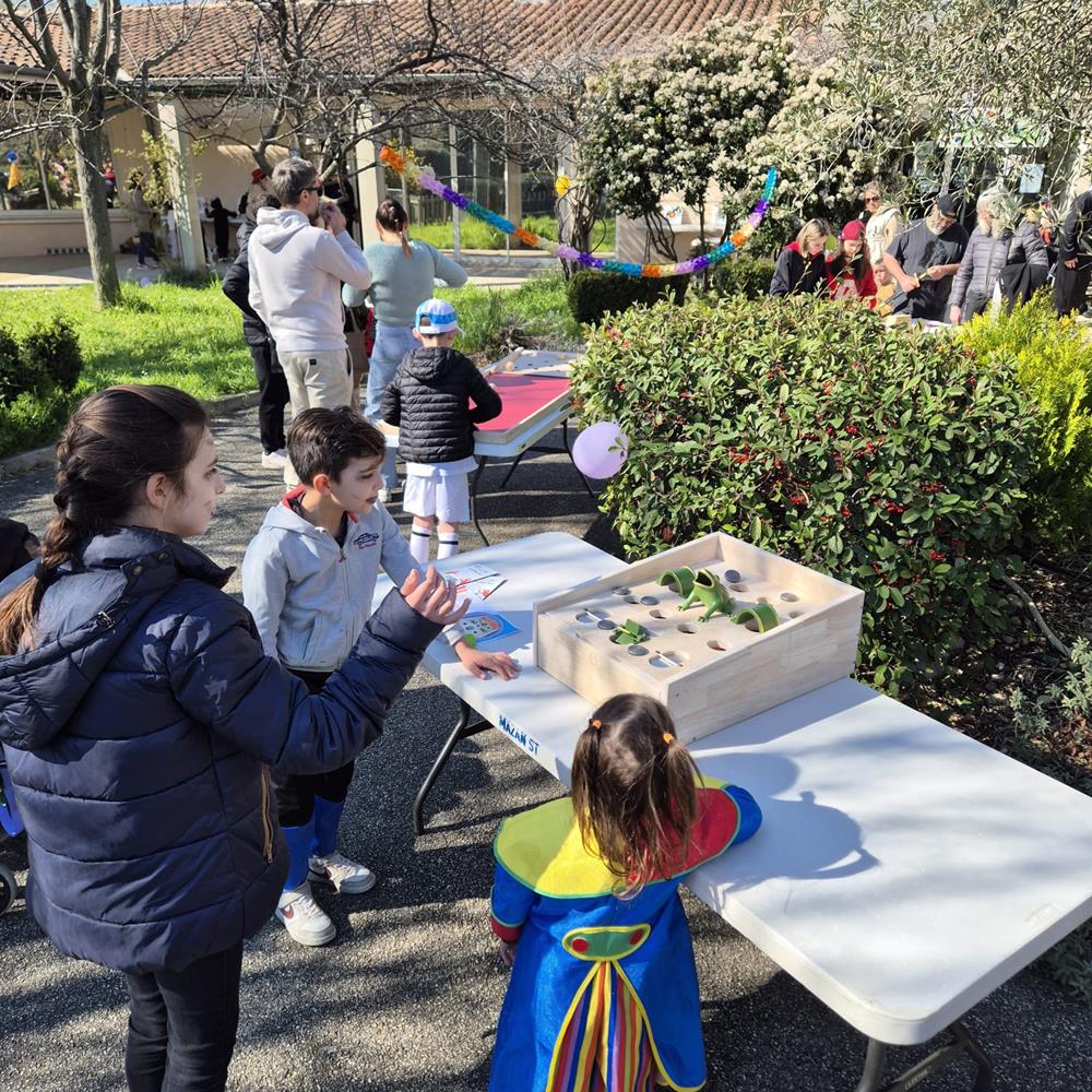 Photo Location Jeu du Tonneau lors d'une kermesse avec enfants dans le Gard (30)